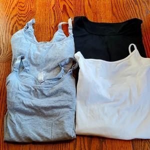 Bundle of maternity/nursing shirts.